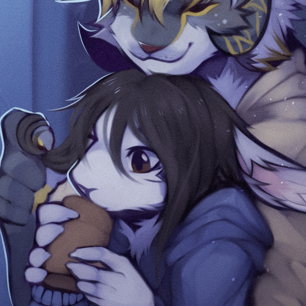 Mari and Zuri cuddling by the window