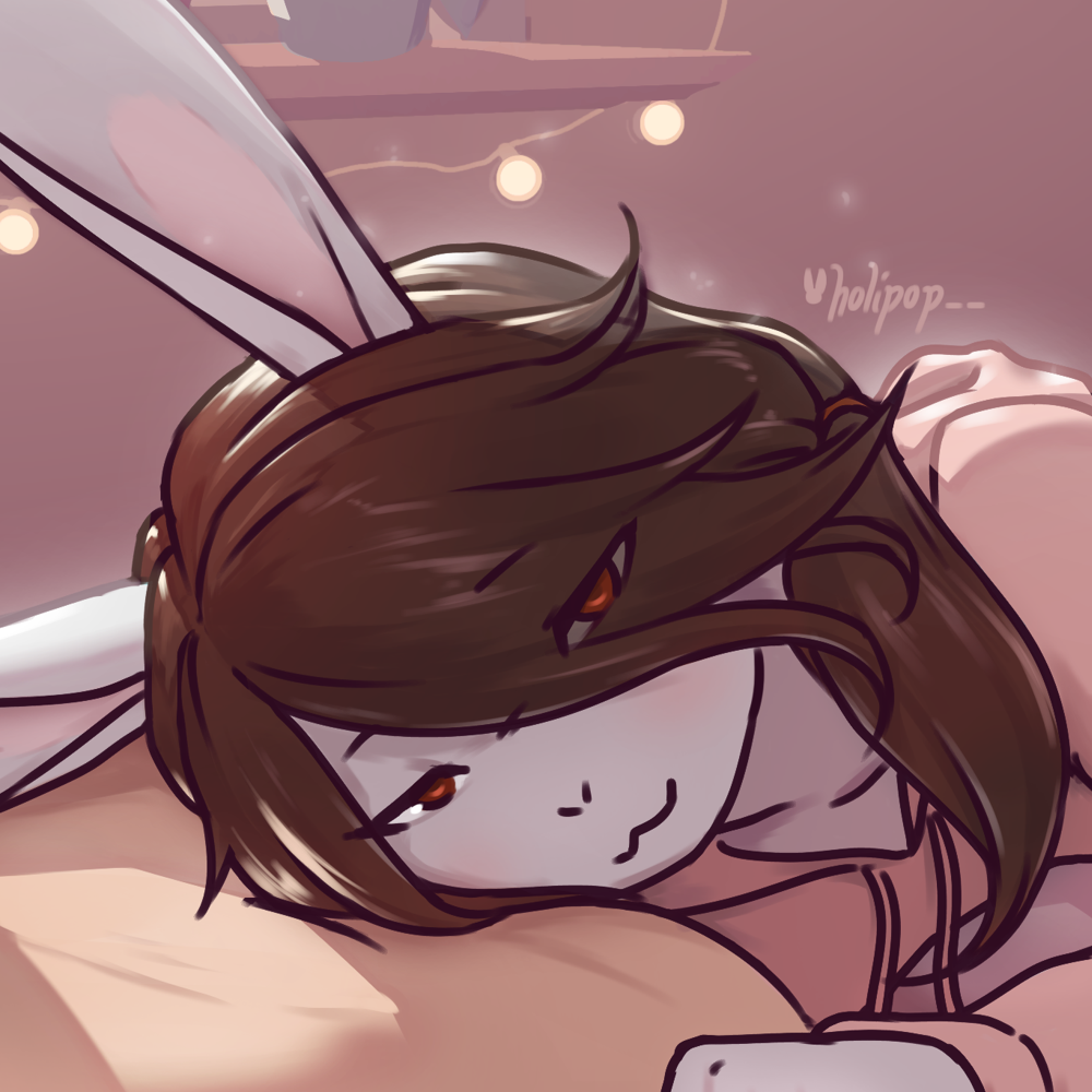 Mari laying down on his bed